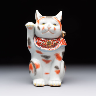 A Japanese Kutani figure of a Maneki-neko Beckoning Cat, 20th C.