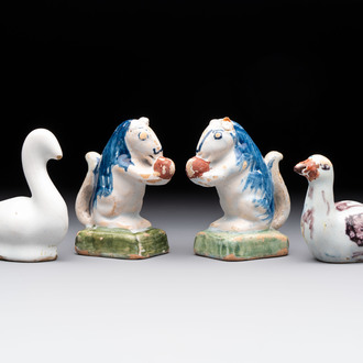 A pair of polychrome Dutch Delft miniature models of squirrels, a duck and a swan, 18th C.