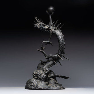 A large Japanese bronze dragon holding a pearl, Meiji, 19th C.