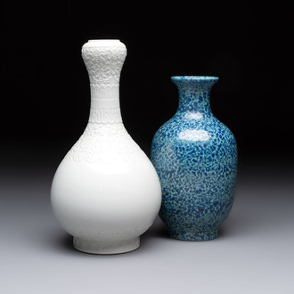 A Chinese white-glazed garlic-head vase and a robin’s egg-glazed vase, Qianlong mark, 20th C.