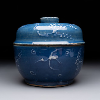 A rare Chinese Swatow white slip-decorated blue-ground bowl and cover, Ming