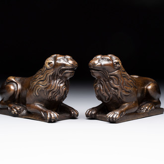 A pair of reclining bronze lions, probably Dinant, 16th C.