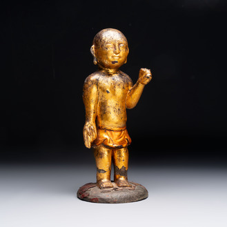 A rare and large Chinese gilt-lacquered bronze Buddha, Ming