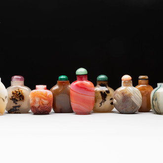 A collection of nine Chinese agate snuff bottles, 20th C.