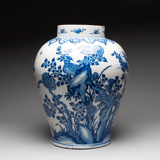 A large blue and white Dutch Delft Kangxi-style chinoiserie 'pheasant among peonies' vase, early 18th C.