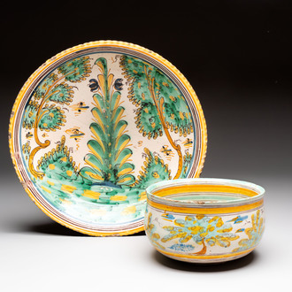 A large polychrome Spanish pottery dish and a bowl with a bird, Talavera, 18th C.