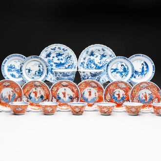 Eight Chinese blue, white and iron-red cups and twelve saucers, Kangxi/Yongzheng