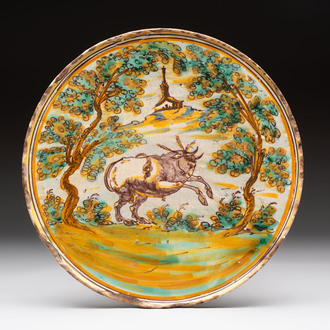A fine polychrome Spanish pottery tazza with a leaping bull, Talavera, 18th C.