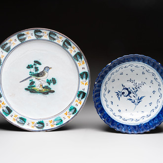 A large polychrome Brussels faience 'bird' dish and a blue and white bowl, 18/19th C.