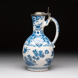 A blue and white Dutch Delft jug with pewter cover, 1st quarter 18th C.