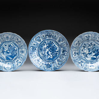 Three Chinese blue and white 'kraak' dishes with a bird and flowers, Wanli