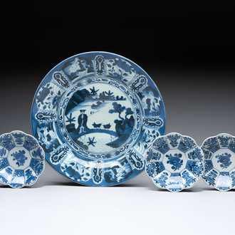 Three Japanese blue and white flower-shaped plates and a 'fisherman' dish, Edo, 17/18th C.