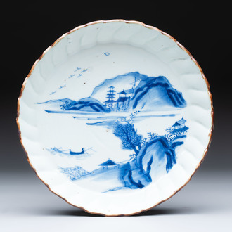 A Chinese blue and white ko-sometsuke 'riverscape' plate for the Japanese market, Chenghua mark, late Ming