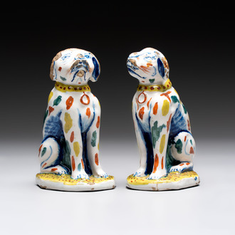 A pair of polychrome Dutch Delft dogs, 18th C.