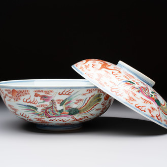 A Chinese famille rose 'dragon and phoenix' bowl and cover, Jiaqing mark and of the period