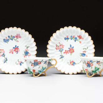 Two Chinese gilt-decorated famille rose cups and saucers with floral design, Qianlong