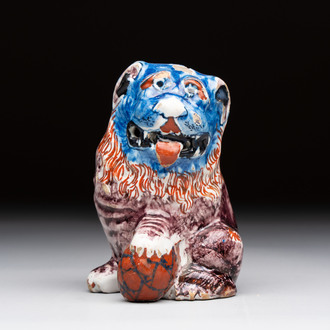 A polychrome Dutch Delft model of a lion, 18th C.