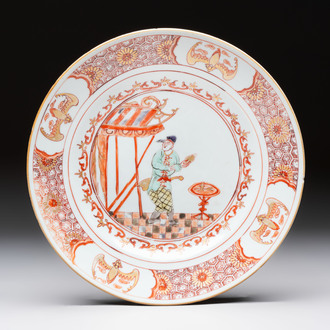 A rare Chinese polychrome 'Commedia dell'arte' 'South Sea Bubble' plate, Yongzheng, ca. 1720-1725