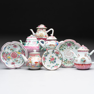 A group of five Chinese famille rose teapots and covers and three stands, Yongzheng/Qianlong