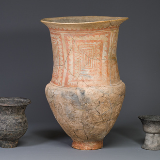 A massive Ban Chiang culture pottery vessel and two grey pottery jars, Thailand 7/4th C. B.C.