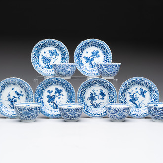 A set of six Chinese blue and white cups and saucers with floral design, Kangxi