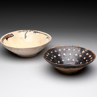 A Samanid pottery 'Kufic' inscribed bowl and a white-spotted brown-ground bowl, Iran, 10th C.