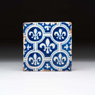 A blue and white Dutch Delft 'French lilies' tile, ca. 1600