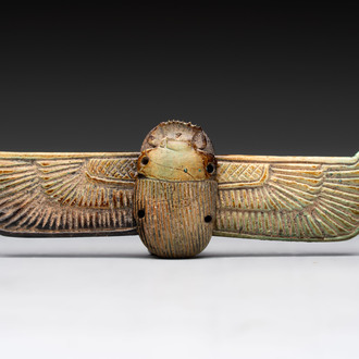 An Egyptian turquoise-glazed composition winged scarab, Ptolemaic, 4/1st C. B.C.