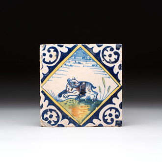 A polychrome Dutch Delft maiolica 'bear' tile, late 16th C.