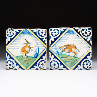 Two polychrome Dutch Delft maiolica 'rabbit' and 'boar' tiles, late 16th C.