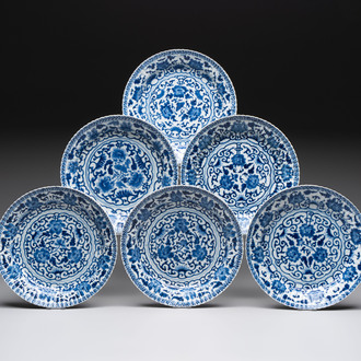 Six Chinese blue and white 'peony scroll' plates, Kangxi