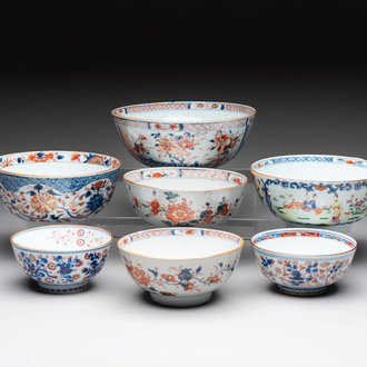 Seven Chinese Imari-style and famille rose bowls with floral and figural designs, 18th C.