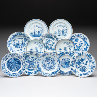 12 Chinese blue and white plates with figural and floral design, 18th C.