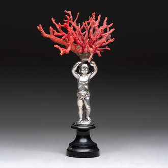A red coral mounted silver figure, possibly Germany, 19th C.