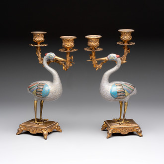 A pair of Chinese cloisonné cranes, later mounted as candelabras, 19th C.