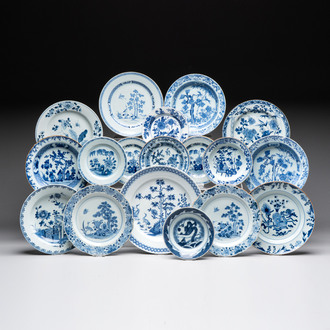 18 Chinese blue and white plates and saucers with floral design, 18th C.
