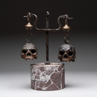 An Italian 'vanitas' or 'memento mori' composition with skulls and forged iron mount, 18/19th C.