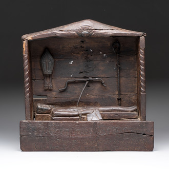 A carved wooden religious shrine depicting the martyrdom of Saint Erasmus of Formia, Germany, 17/18th C.