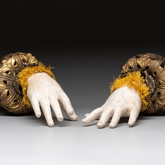 A pair of plaster hands with gilt-bronze cuffs and fabric adornments, Italy, 19th C.