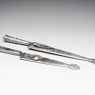 Two Argentinian silver gaucho knives with finely engraved design, 19th C.