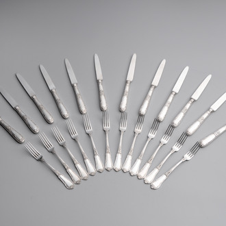 A set of 12 silver dessert forks and dessert knives, 835/000, Wolfers Frères, Brussels, 20th C.