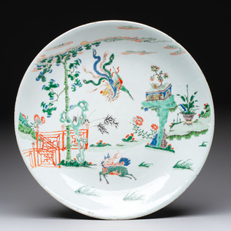 A large Chinese famille verte 'qilin and phoenix' dish, Kangxi