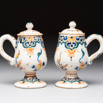 A pair of polychrome Dutch Delft mustard jars and covers, 18th C.