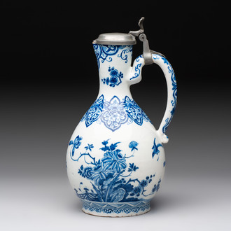 A fine blue and white Dutch Delft jug with pewter cover, early 18th C.