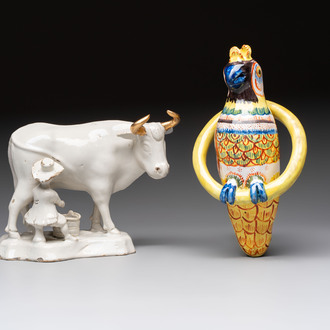 A white Dutch Delft cow milker group and a polychrome Dutch Delft parrot, 18/19th C.