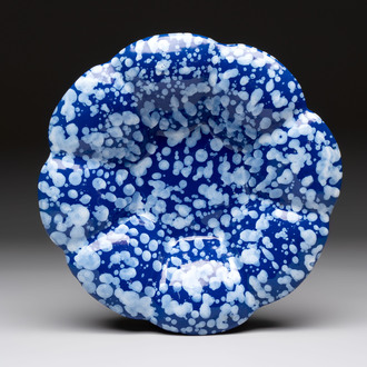A Nevers white-splashed blue-ground 'à la bougie' dish, France, late 17th C.