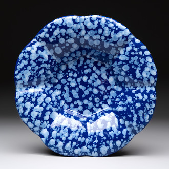 A Nevers white-splashed blue-ground 'à la bougie' dish, France, late 17th C.