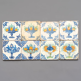 Eight blue, white and polychrome Dutch Delft 'fruit basket' tiles, ca. 1600
