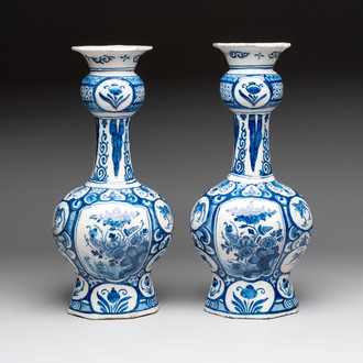 A pair of blue and white Dutch Delft vases with floral design, 18th C.