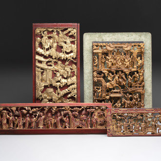 Four Chinese gilt-lacquered carved wooden panels with narrative design, 19th C.